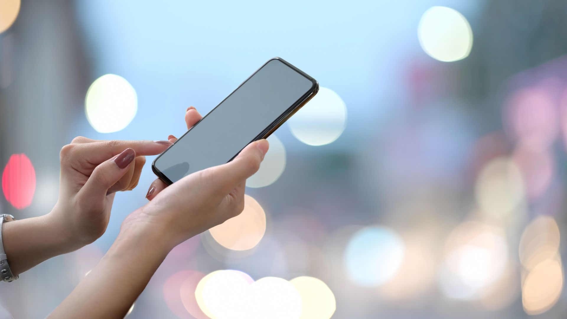 woman holding phone